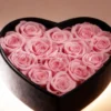 Heart shaped box filled with pink real roses
