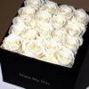 Elegant white rose arrangement in black square box