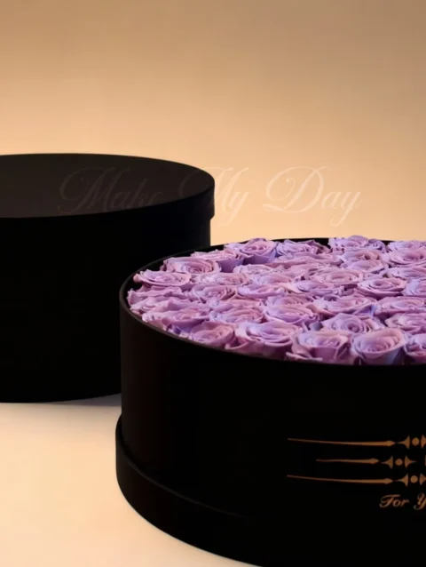 Luxury round box filled with fresh real roses